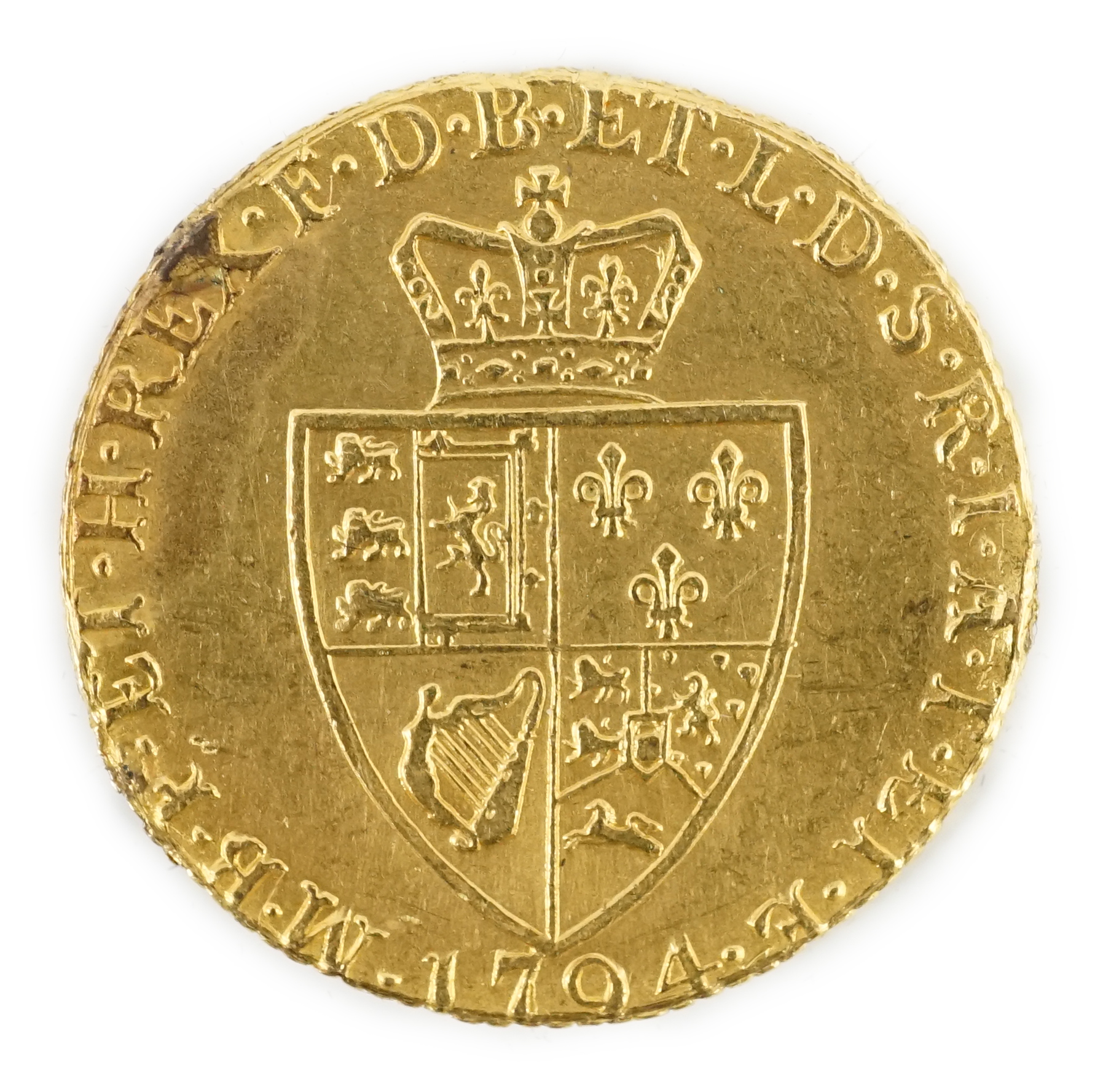 A George III gold spade guinea, 1794 (ex mounted)